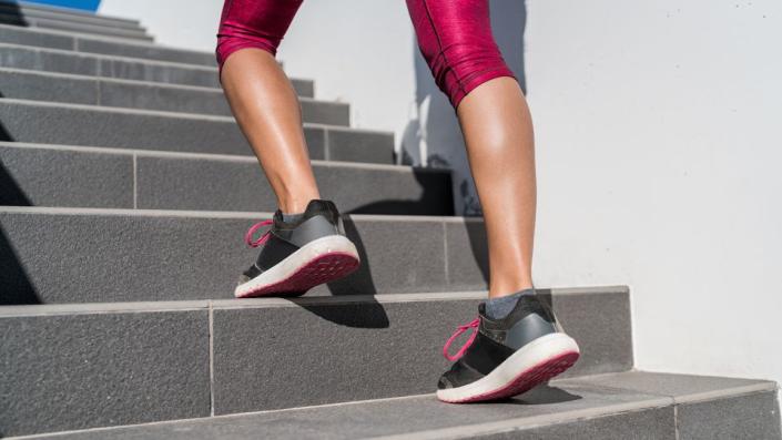 Adding in a short workout such as climbing stairs is a good way to get in your daily exercise. - Maridav/iStockphoto/Getty Images