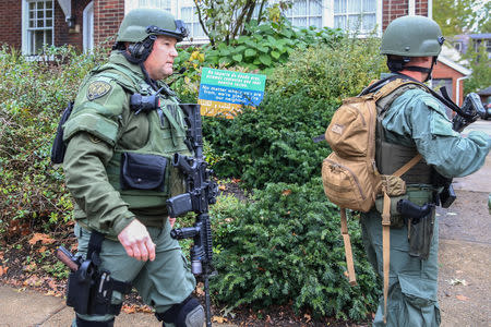 SWAT police officers respond after a gunman opened fire at the Tree of Life synagogue in Pittsburgh, Pennsylvania, U.S., October 27, 2018. REUTERS/John Altdorfer