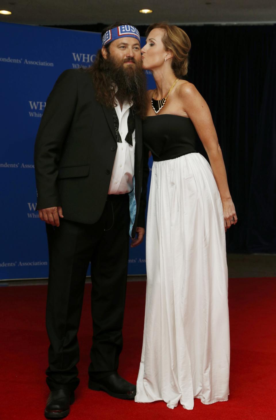 Willie and Korie Robertson arrive on the red carpet at the annual White House Correspondents' Association Dinner in Washington, May 3, 2014. (REUTERS/Jonathan Ernst)