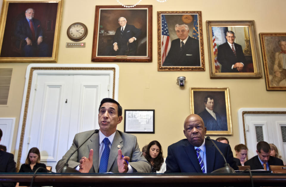 House Oversight and Government Reform Committee Chairman Rep. Darrell Issa, R-Calif., left, and the committee's ranking Democrat Rep. Elijah Cummings, D-Md., go to the House Rules Committee, on Capitol Hill in Washington, June of 2012, to argue procedures as the House of Representatives prepares to vote on whether Attorney General Eric Holder is in contempt of Congress because he has refused to give the Oversight Committee all the documents it wants related to Operation Fast and Furious, the flawed gun-smuggling probe involving Mexican drug cartels. (Photo: J. Scott Applewhite/AP)