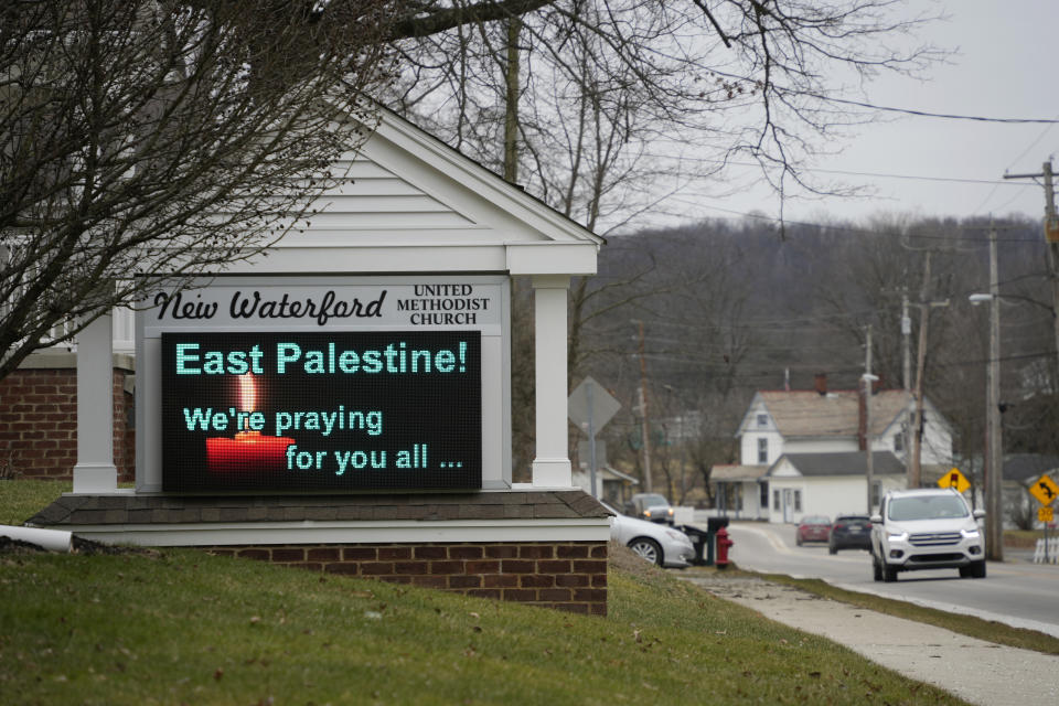 This is a sign outside the New Waterford, Ohio, United Methodist Church on Monday, Feb. 6, 2023, in support of neighboring community East Palestine, Ohio, that has been evacuated due to burning tank cars from a Norfolk and Southern derailment that took place Friday night. (AP Photo/Gene J. Puskar)