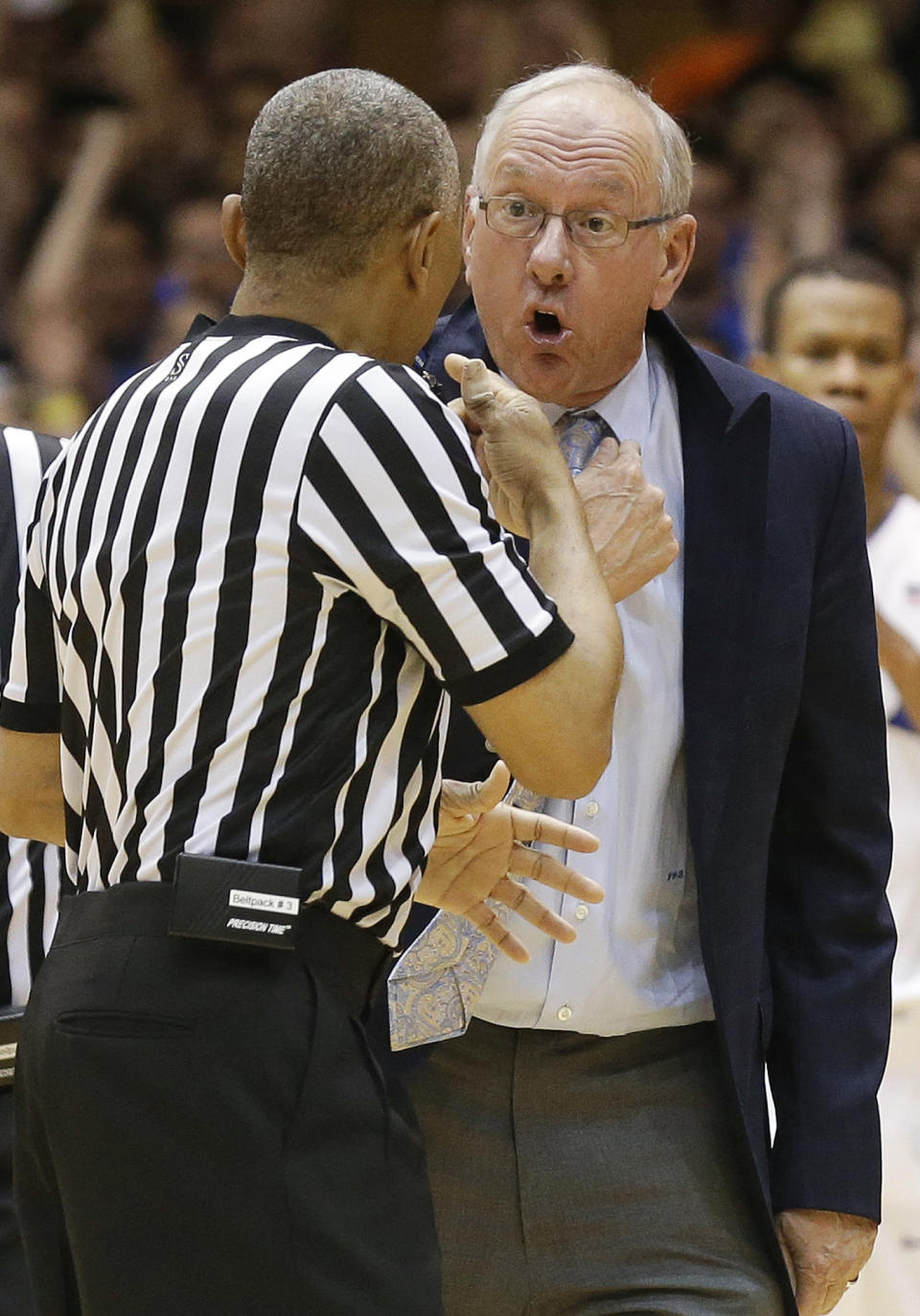 Syracuse coach Jim Boeheim argues with an official before receiving a technical foul during the second half of an NCAA college basketball game against Duke in Durham, N.C., Saturday, Feb. 22, 2014. Duke won 66-60. (AP Photo/Gerry Broome)