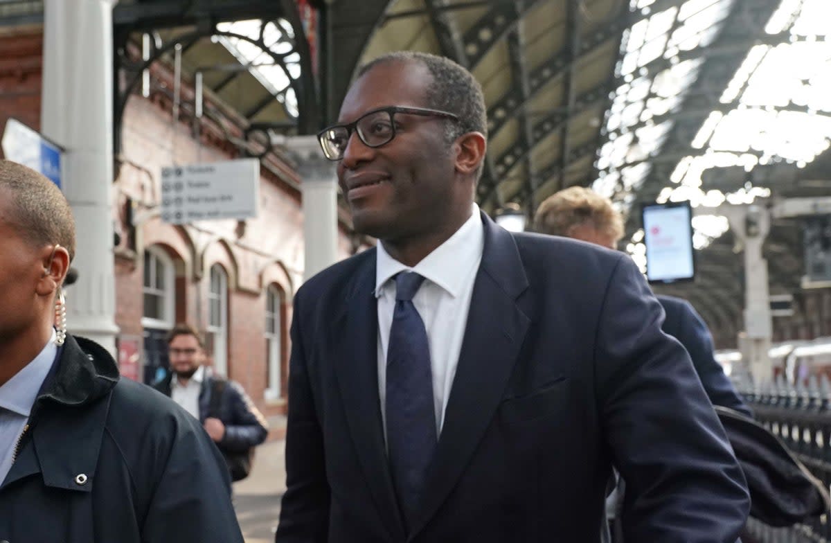 Kwasi Kwarteng arrives at Darlington station on Thursday  (PA)