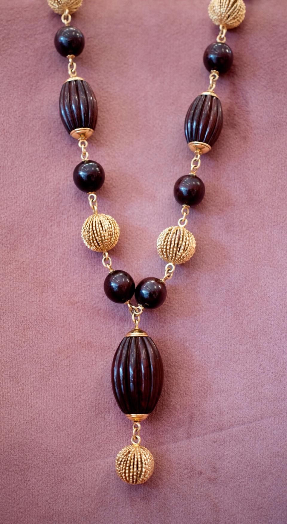 This Van Cleef and Arpels Snakewood and Gold necklace has an estimated value of between $30,000 and $50,000.