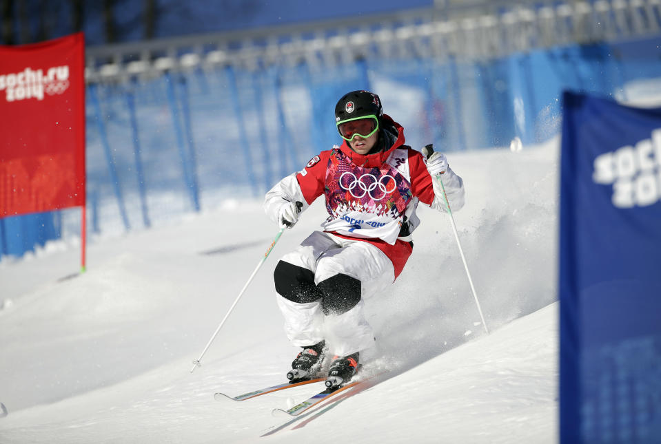 Canada's Alex Bilodeau runs the course during freestyle skiing moguls training at the Rosa Khutor Extreme Park ahead of the 2014 Winter Olympics, Friday, Feb. 7, 2014, in Krasnaya Polyana, Russia. (AP Photo/Andy Wong)