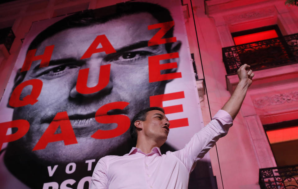 Spain's Prime Minister and Socialist Party leader Pedro Sanchez gestures to supporters outside the party headquarters following the general election in Madrid, Spain, Sunday, April 28, 2019. A divided Spain voted Sunday in its third general election in four years, with all eyes on whether a far-right party will enter Parliament for the first time in decades and potentially help unseat the Socialist government. (AP Photo/Bernat Armangue)