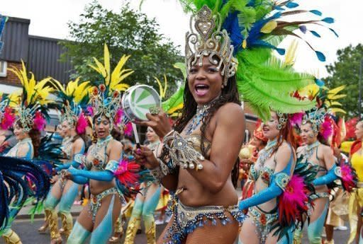 Performers take part in the Notting Hill Carnival in London on August 27. Revellers filled the streets of west London as Europe's biggest street festival reached its climax with its famous Caribbean-inspired parade