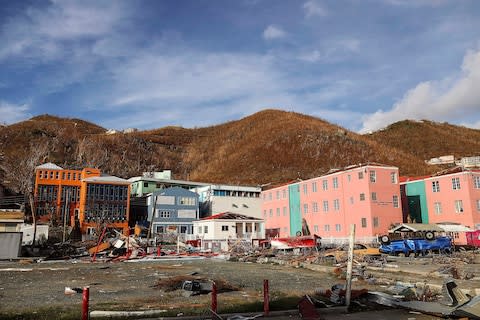 It will take years to rebuild in some of the worst spots like Barbuda (pictured) - Credit: AFP