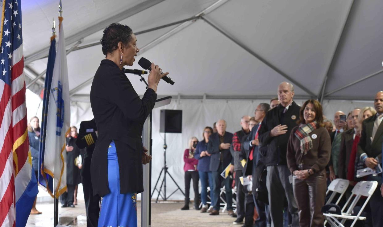 Vocalist Candida Rose sings the National Anthems of Cape Verde and the United States to open the program during a homecoming celebration for the SSV Ernestina-Morrissey in 2022 at the State Pier in New Bedford.