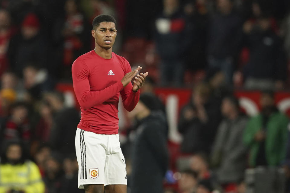 Manchester United's Marcus Rashford celebrates after the English League Cup quarter final soccer match between Manchester United and Charlton Athletic at Old Trafford in Manchester, England, Tuesday, Jan. 10, 2023. (AP Photo/Dave Thompson)