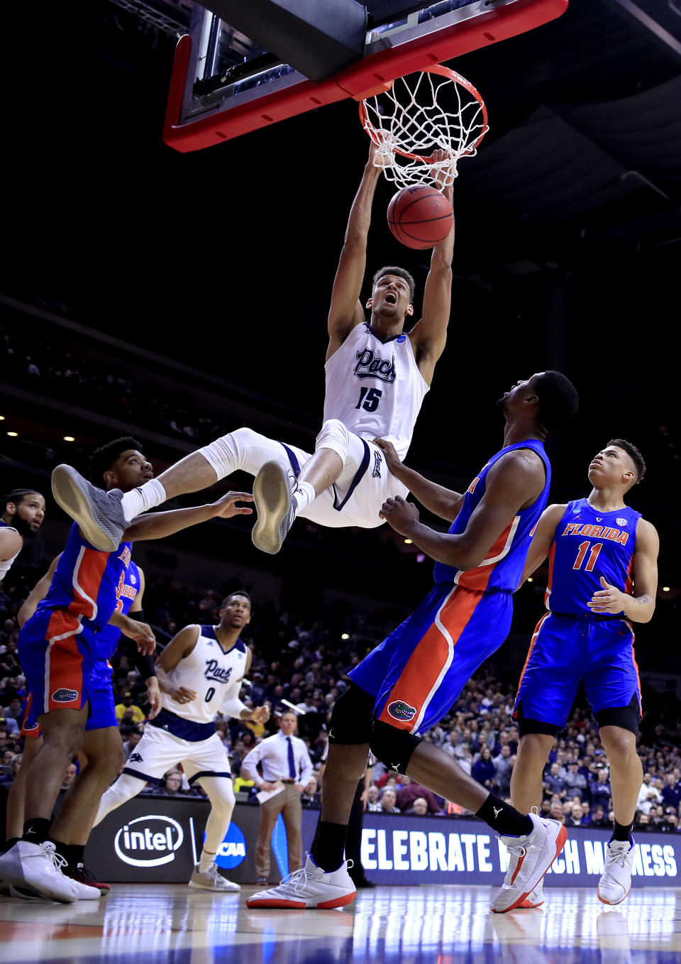 <p>Trey Porter #15 of the Nevada Wolf Pack dunks the ball against the Florida Gators in the first half during the first round of the 2019 NCAA Men’s Basketball Tournament at Wells Fargo Arena on March 21, 2019 in Des Moines, Iowa. </p>