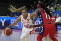 Puerto Rico's Arella Guirantes tries to get past United States' Kahleah Copper at the women's Basketball World Cup in Sydney, Australia, Friday, Sept. 23, 2022. (AP Photo/Mark Baker)
