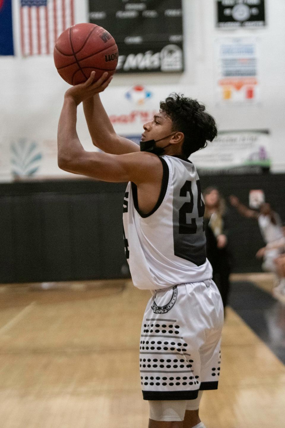 Pueblo South High School's Maurice Austin fires off a 3-point shot during a game against Palmer Ridge on Thursday, Dec. 9, 2021, in Pueblo, Colo.