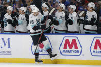 Seattle Kraken defenseman Carson Soucy (28) celebrates after his goal during the first period of an NHL hockey game against the Buffalo Sabres, Monday, Nov. 29, 2021, in Buffalo, N.Y. (AP Photo/Jeffrey T. Barnes)