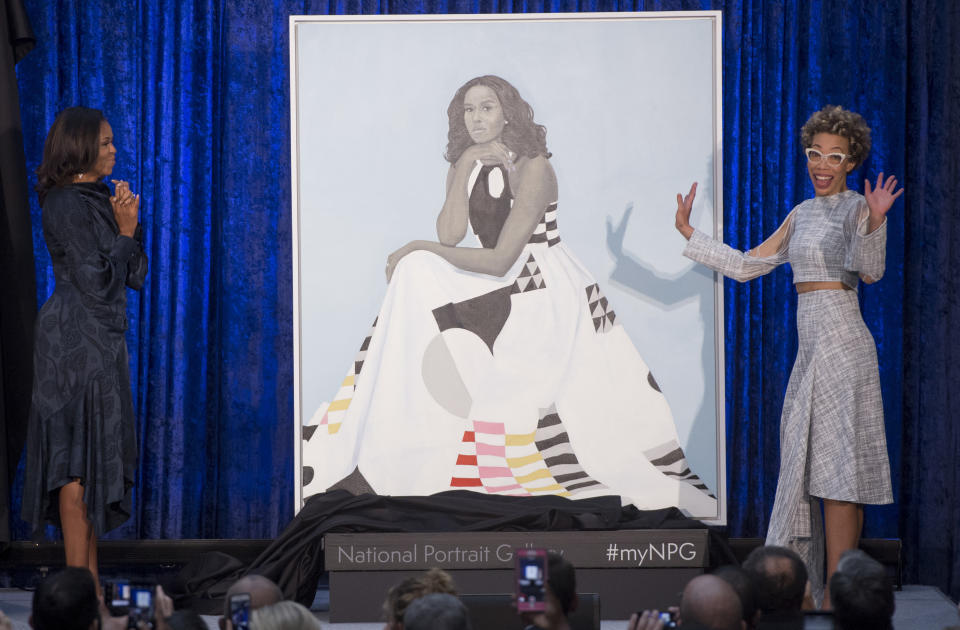 Michelle Obama and artist Amy Sherald unveil the former first lady's official portrait at the National Portrait Gallery. (Photo: SAUL LOEB via Getty Images)