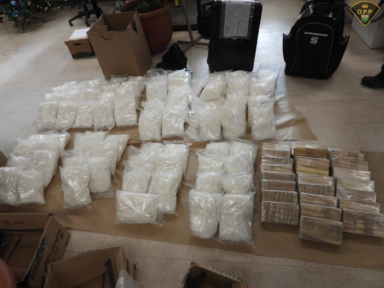 The drugs seized on Jan. 21 in Toronto have a potential street value of over $13 million, police said in a news release on Wednesday.  (Ontario Provincial Police - image credit)