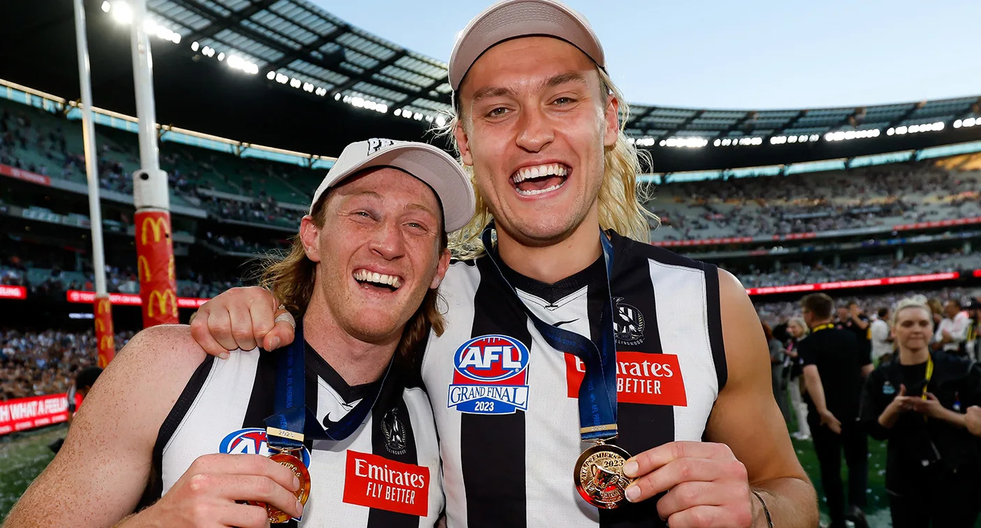 Seen here, Darcy Moore and Nathan Murphy after winning the AFL grand final with Collingwood in 2023.