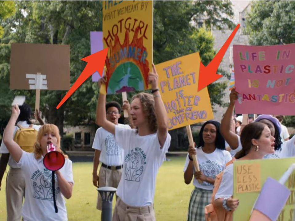 arrows pointing to students posters about climate change in do revenge