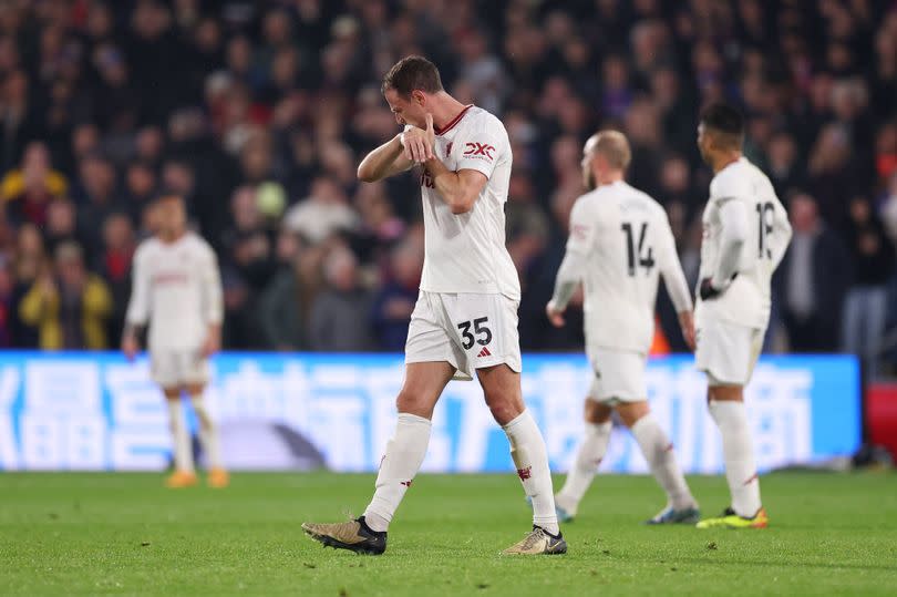 Jonny Evans of Manchester United looks dejected after Jean-Philippe Mateta of Crystal Palace scored his team's second goal