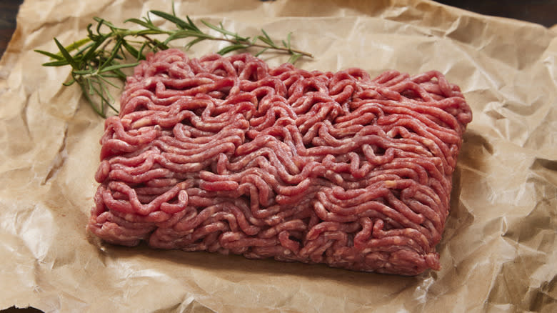 ground beef on parchment paper