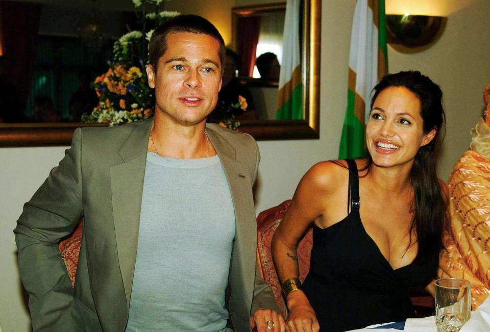Brad and Angelina at a press conference in 2006 (AFP via Getty Images)