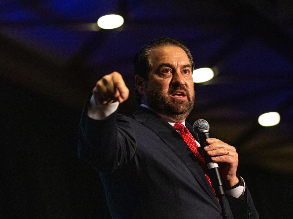 Arizona Attorney General Mark Brnovich speaks to a crowd of Republican voters at the party’s primary debate for the U.S Senate in Phoenix on June 23, 2022.