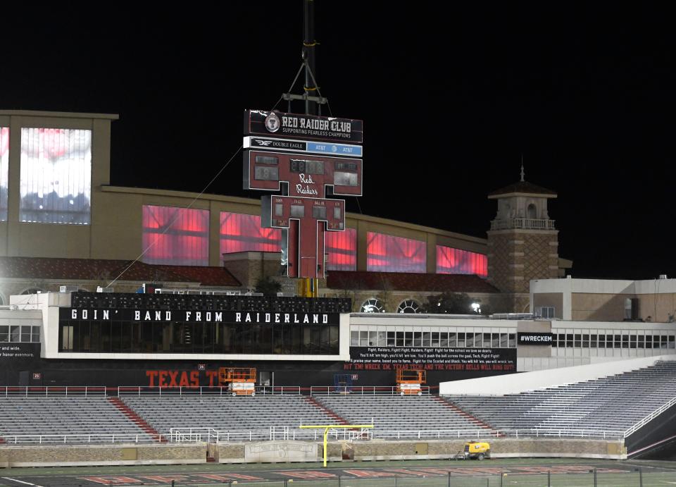 The Double T scoreboard, installed in June 1978 at the south end of Jones Stadium, was removed by crane Thursday night. The portion of the scoreboard above the current south end zone building was successfully hoisted in one piece and placed onto a flatbed to be driven off site.