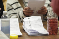 Votes are counted at Alive Lynnsport in King's Lynn, in Norfolk, England, during the count for the South West Norfolk constituency in the 2024 General Election, Thursday, July 4, 2024. Britain’s Labour Party was headed for a huge majority in Britain’s election on Thursday, an exit poll suggested (Jacob King/PA via AP)