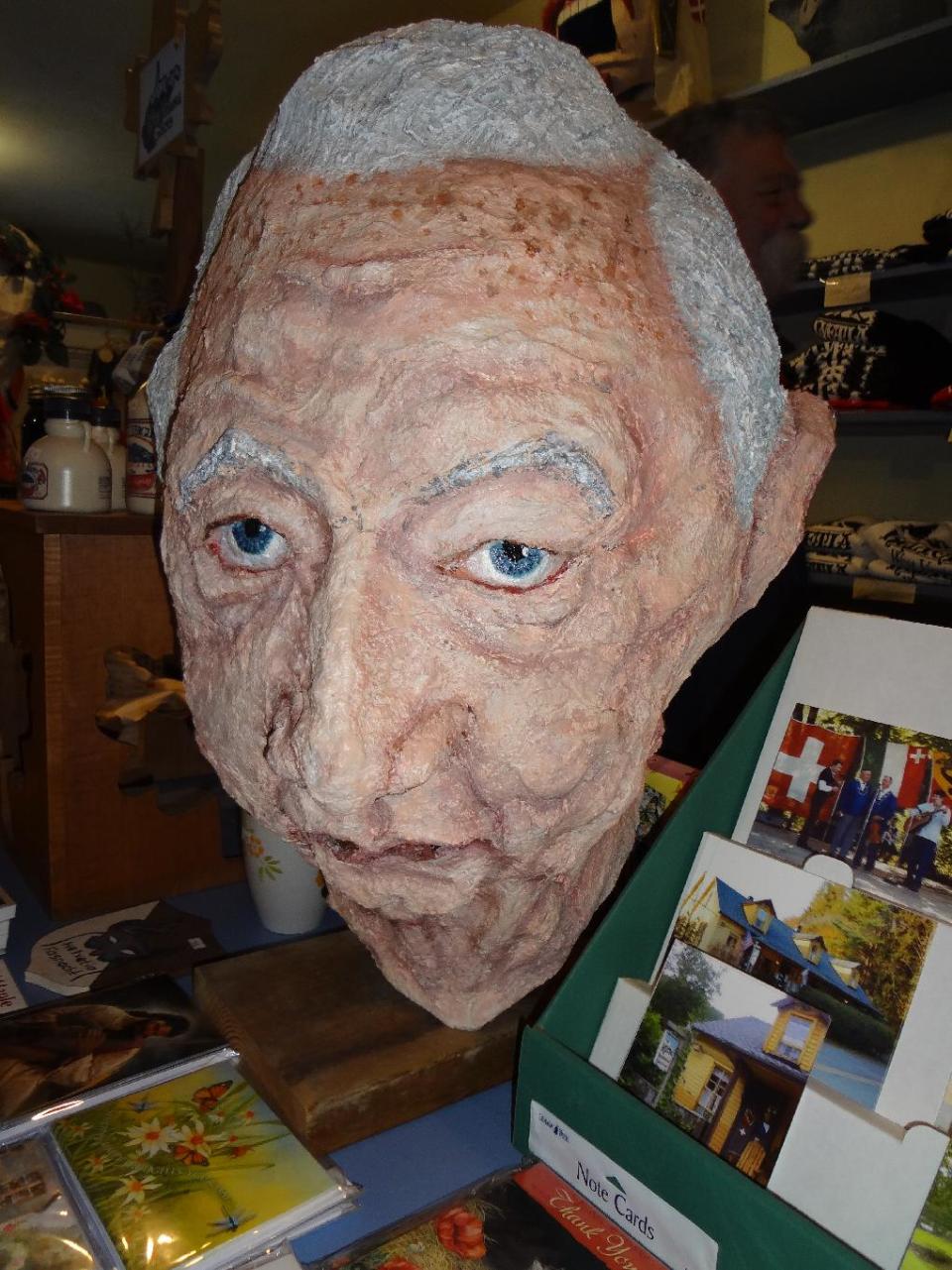 A homemade mask of West Virginia's late U.S. senator, Robert C. Byrd, sits in the store and mask museum in Helvetia, W.Va., on Saturday, Feb. 9, 2013, where revelers were celebrating the annual Fasnacht festival. (AP Photo/Vicki Smith)