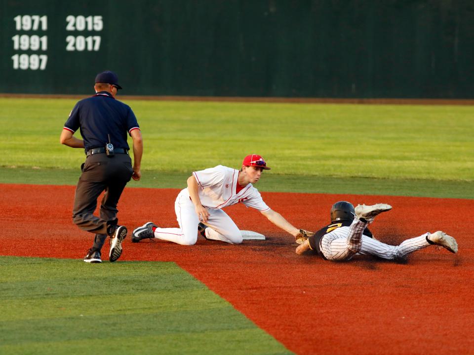 Sheridan second baseman Noah Wamer lays the tag on Gaige Stuckey during a 3-1 loss to Washington Court House Miami Trace during a Division II district semifinal at Bob Wren Stadium in Athens. Sheridan finished a 24-4 season.