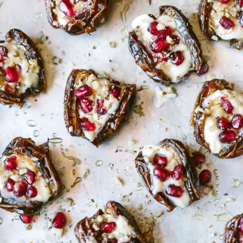 <p>Fool Proof Living</p><p>A little fruity and a little cheesy, these stuffed dates are the perfect mid-day treat.</p><p><strong>Get the recipe: </strong><a href="https://foolproofliving.com/mascarpone-stuffed-dates/?fbclid=IwAR36TNpZKhmcn1wBfpCHDy3fq4C-tgQArhA2Lx5k4HASXM-XBkCXzV7k9BU" rel="nofollow noopener" target="_blank" data-ylk="slk:Mascarpone Stuffed Dates with Pomegranate and Honey;elm:context_link;itc:0;sec:content-canvas" class="link "><strong>Mascarpone Stuffed Dates with Pomegranate and Honey</strong></a></p>