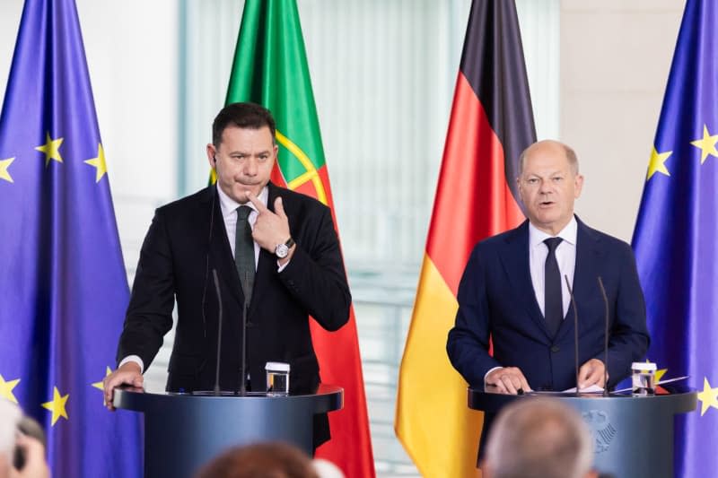 Germany's Chancellor Olaf Scholz (R) takes part in a joint press conference with Luis Montenegro (L), Prime Minister of Portugal, following talks at the Federal Chancellery. Christoph Soeder/dpa
