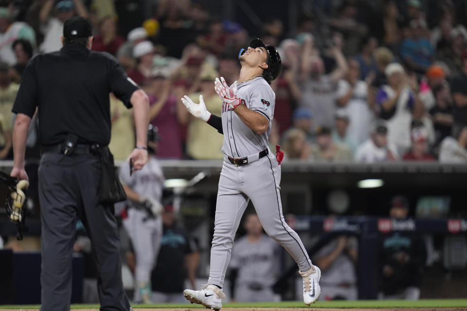 Arizona Diamondbacks' Alek Thomas celebrates after hitting a grand slam during the ninth inning of a baseball game against the San Diego Padres, Friday, July 5, 2024, in San Diego. (AP Photo/Gregory Bull)