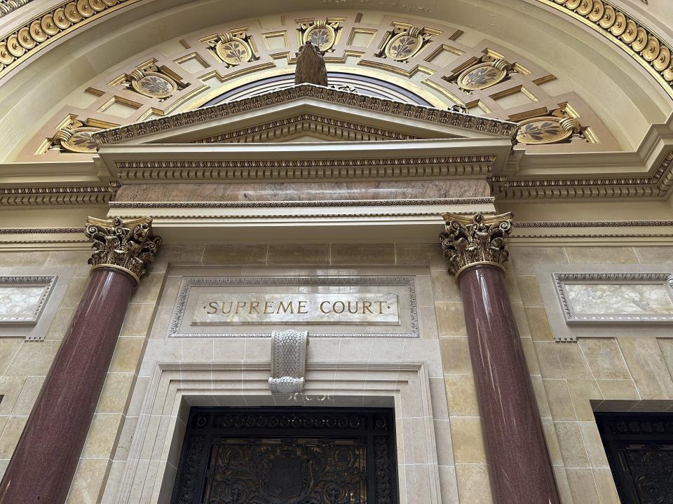 FILE - The entrance to the Wisconsin Supreme Court chambers is seen in the state Capitol in Madison, Wis. March 14, 2024. A divided Wisconsin Supreme Court on Tuesday asked for arguments within two days related to a question over what legislative boundaries should be in place for a potential recall election organized by supporters of former President Donald Trump. (AP Photo/Todd Richmond, File)