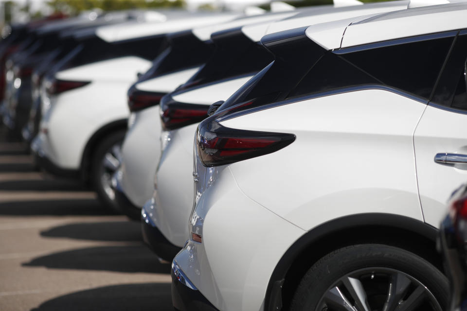 In this Aug. 25, 2019, photo unsold Murano sports-utility vehicles sit at a Nissan dealership in Highlands Ranch, Colo. On Wednesday, Oct. 16, the Commerce Department releases U.S. retail sales data for September. (AP Photo/David Zalubowski)