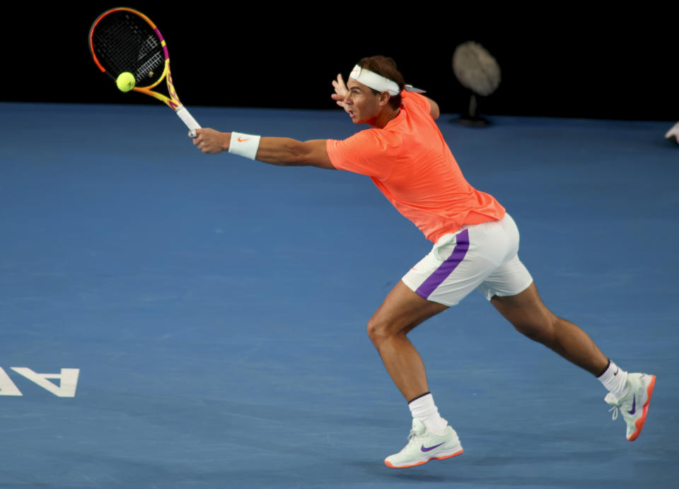 Spain's Rafael Nadal makes a backhand return to Austria's Dominic Thiem during an exhibition tennis event in Adelaide, Australia, Friday, Jan 29. 2021. (Kelly Barnes/AAP Image via AP)