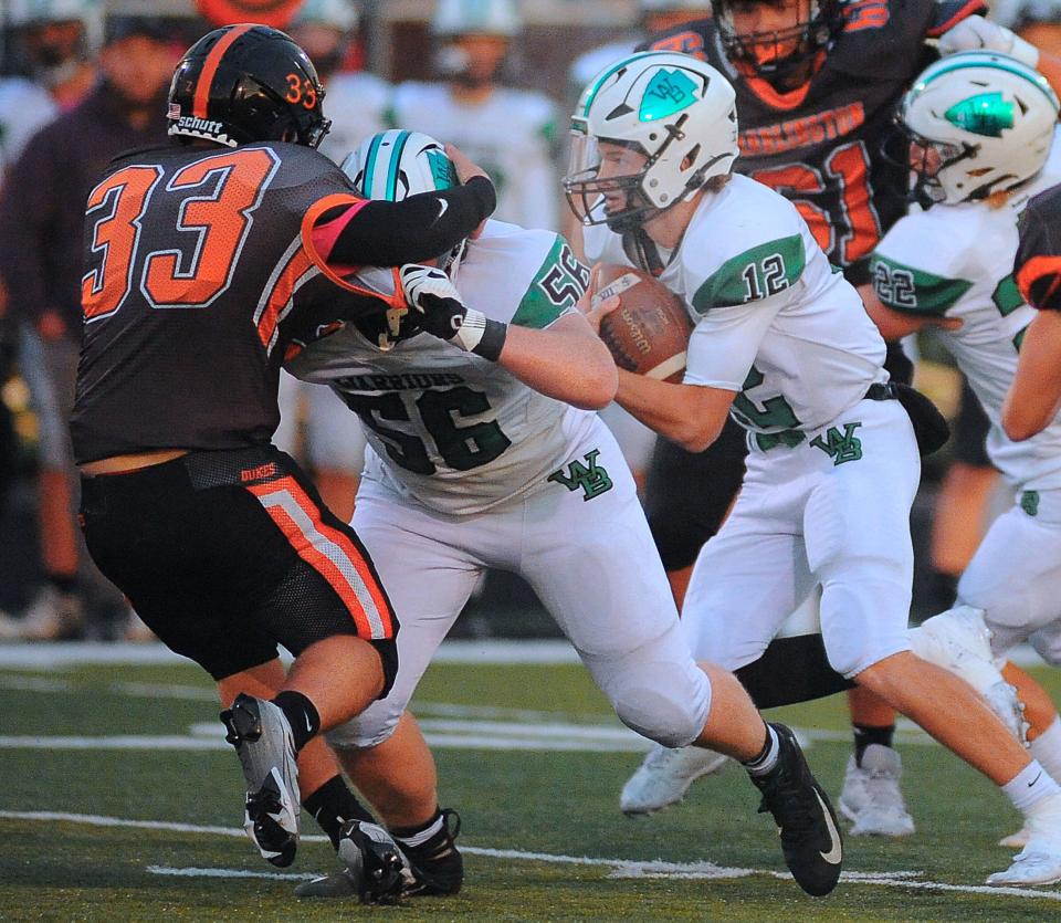 West Branch's Dru DeShields carries the ball for a long gain during an Eastern Buckeye Conference game against the Dukes at Marlington High School Friday, September 30, 2022.