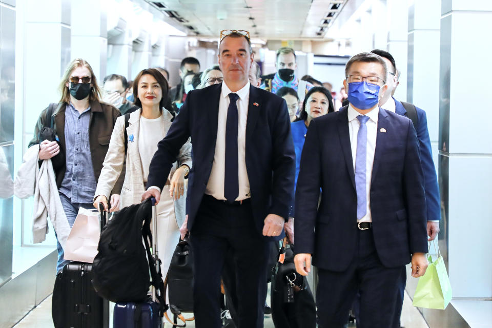 In this photo released by the Taiwan Ministry of Foreign Affairs, Eric Bothorel, leader of a French National Assembly delegation visiting Taiwan, at center arrives at the Taoyuan International Airport in Taiwan on Monday, April 17, 2023. (Taiwan Ministry of Foreign Affairs via AP)