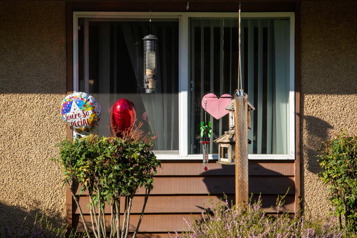 Balloons are left outside a room at The Oaks at Sherwood Park nursing home in Keizer, Ore. The state is more likely than most to issue citations to facilities who report low staffing levels, according to USA TODAY's analysis.
