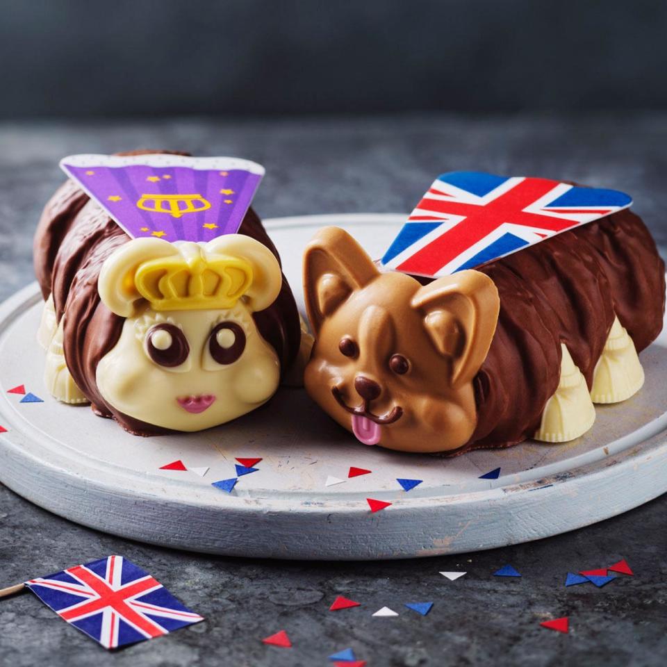 It's Queen Connie and her Corgi doing a Colin the Caterpillar takeover. (Marks &amp; Spencer)