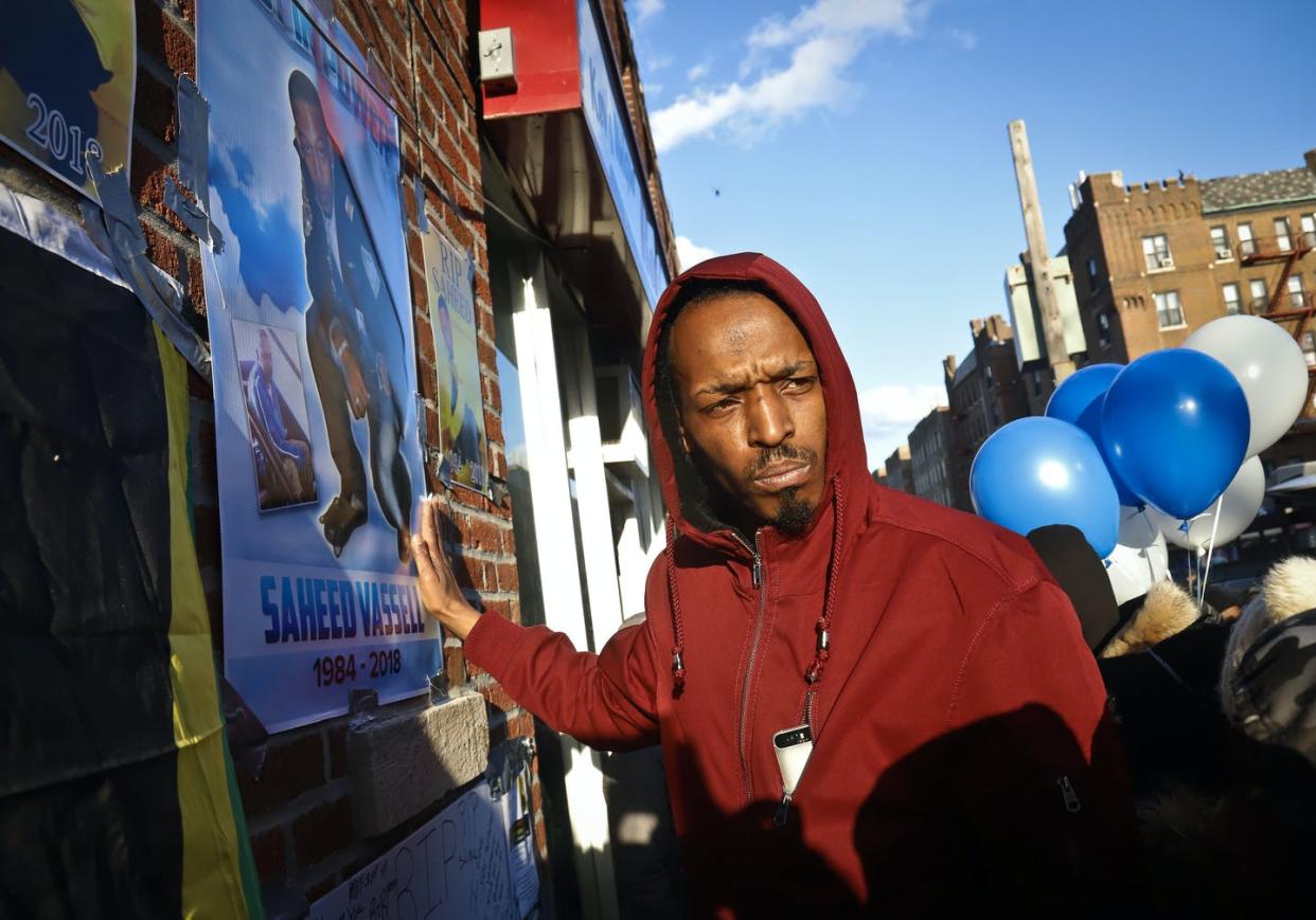 <span class="caption">Darren Spencer at a memorial for his childhood friend Saheed Vassell, a 34-year-old father of a teenage son, fatally shot by police in the Crown Heights neighborhood of Brooklyn, New York, April 5, 2018. </span> <span class="attribution"><a class="link " href="http://www.apimages.com/metadata/Index/Brooklyn-Police-Shooting/18d0a517fd0d438db30e877c1df861ab/14/1" rel="nofollow noopener" target="_blank" data-ylk="slk:AP Photo/Bebeto Matthews;elm:context_link;itc:0;sec:content-canvas">AP Photo/Bebeto Matthews</a></span>