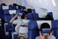 Customers take VR flight experiences at First Airlines in Tokyo