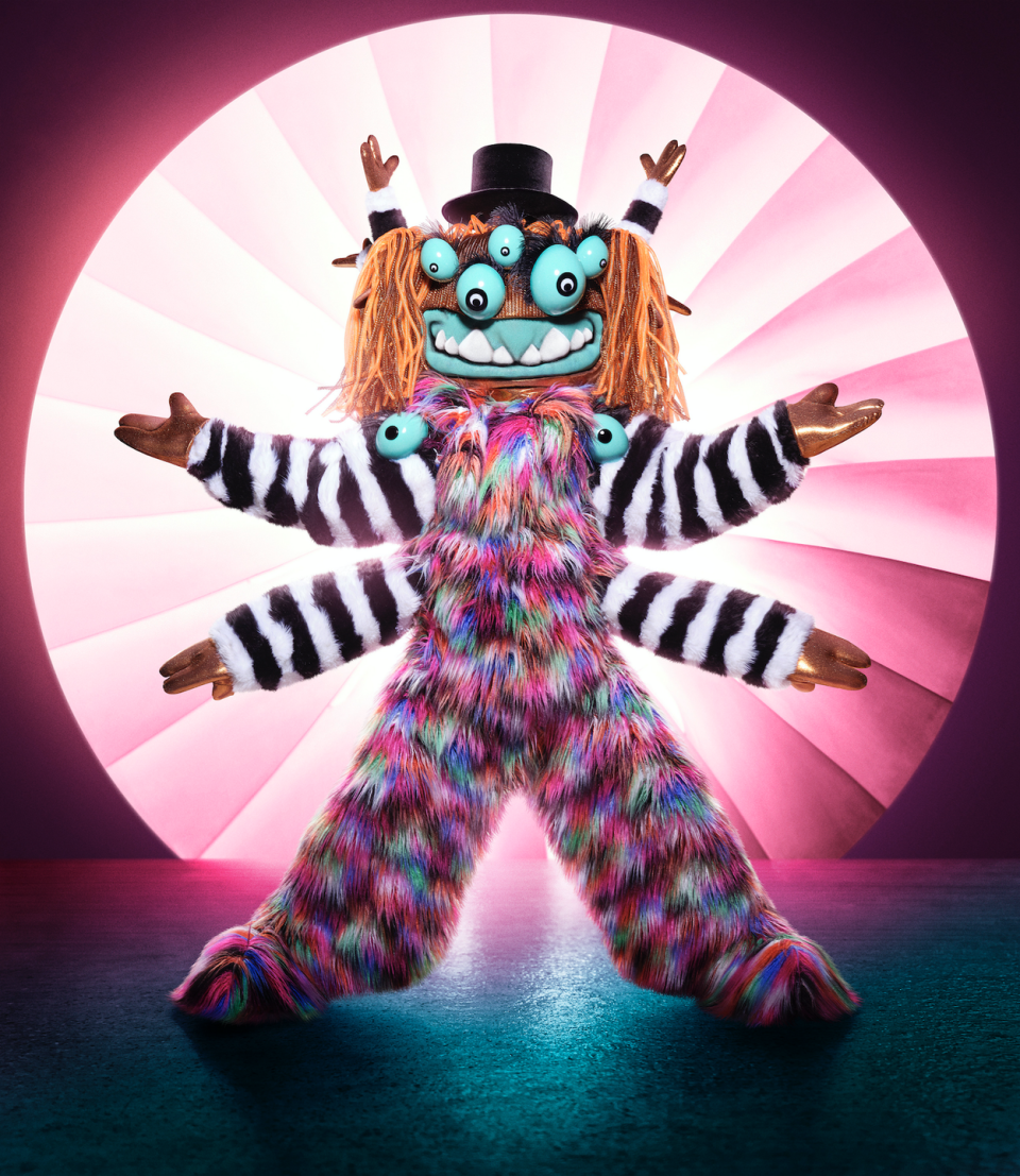 <p><strong><em>The Masked Singer </em>Revealed: </strong>Bob Saget<strong><br></strong></p><p><strong>Clues:</strong></p><p>1) Squiggly Monster has a soft side and an edgy side, which means they “get to be lovable while also being a wild child.”</p><p>2) In a promo video, Squiggly Monster is seen next to a white dog at a birthday party with a cake, a present, and balloons.</p><p>3) Squiggly Monster is “known for having a lot of hands to latch on to.”</p><p>4) Squiggly Monster's clue package included slips and falls. </p>