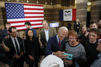 Democratic presidential candidate former Vice President Joe Biden greets audience members during a community event, Wednesday, Oct. 16, 2019, in Davenport, Iowa. (AP Photo/Charlie Neibergall)