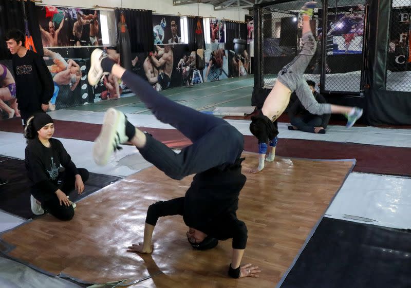 Afghan youth practise breakdancing during a training session in Kabul