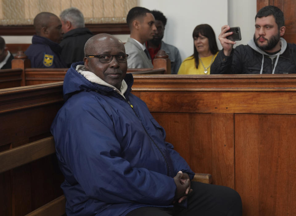 Fulgence Kayishema sits in the Magistrate's Court in Cape Town, South Africa, Friday, May 26, 2023. Kayishema, a former police officer, is one of the most wanted suspects in Rwanda's genocide and is suspected of orchestrating the killing of some 2,000 people nearly three decades ago. He was arrested in South Africa after 22 years on the run, a special tribunal set up by the United Nations to find the perpetrators said Thursday. (AP Photo/Nardus Engelbrecht)