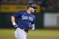 Seattle Mariners' Ty France rounds the bases after hitting a home run against the Oakland Athletics during the fifth inning of a baseball game in Oakland, Calif., Wednesday, Sept. 22, 2021. (AP Photo/Jeff Chiu)