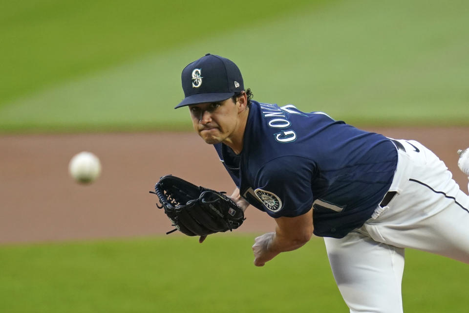 Seattle Mariners starting pitcher Marco Gonzales throws against the Houston Astros in the second inning of a baseball game Monday, Sept. 21, 2020, in Seattle. (AP Photo/Elaine Thompson)