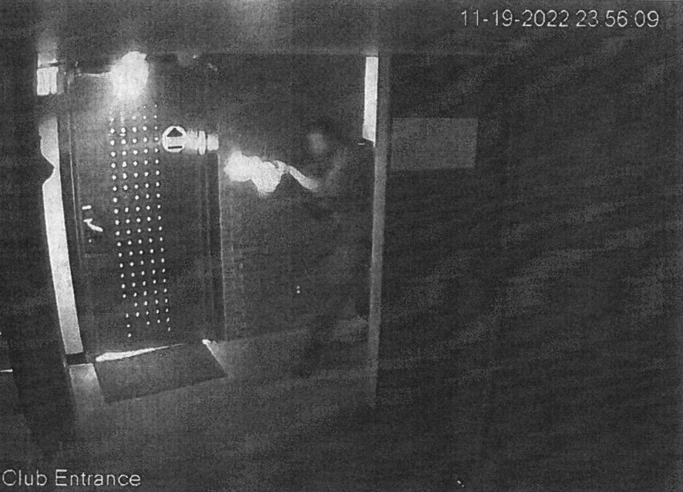A surveillance image in an unsealed arrest affidavit allegedly shows suspected shooter Anderson Lee Aldrich firing into Club Q. (Colorado Springs Police Department)