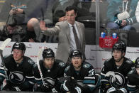 San Jose Sharks coach David Quinn gestures to players during the third period of the team's NHL hockey game against the Dallas Stars in San Jose, Calif., Tuesday, March 26, 2024. (AP Photo/Jeff Chiu)